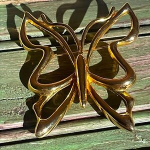 Gold butterfly brooch